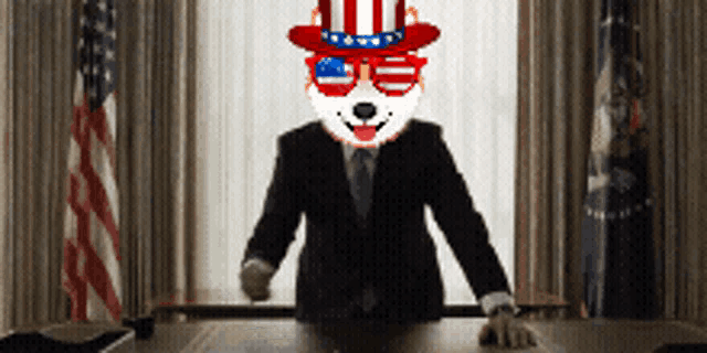 a dog wearing an uncle sam hat and sunglasses sitting at a desk