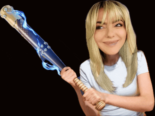 a woman in a white shirt is holding a baseball bat