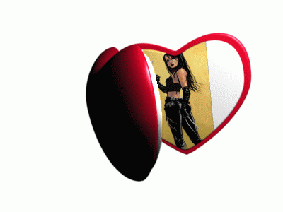a heart shaped mirror with a picture of a woman holding a pair of scissors