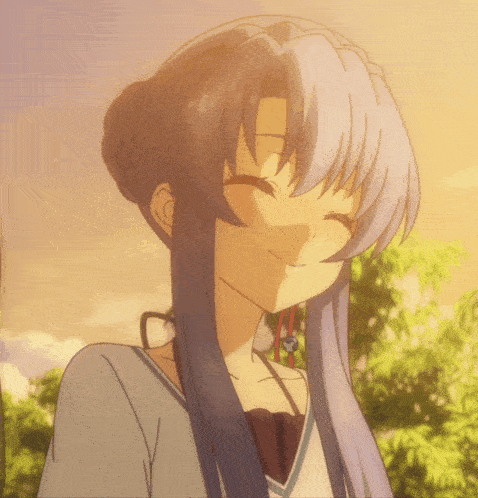 a girl with long purple hair is smiling and looking down