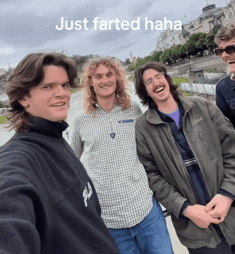 a group of young men are posing for a picture and the caption says just farted haha