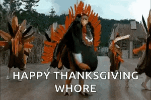 a group of people dressed as turkeys are dancing in a field .