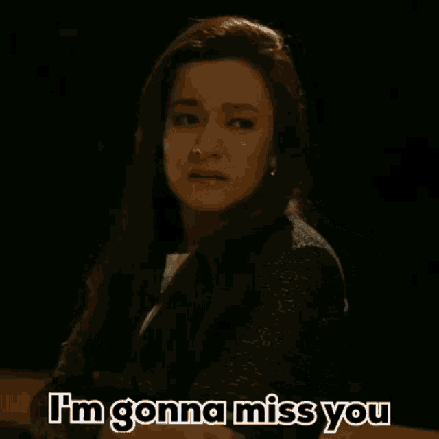 a woman is crying with the words i 'm gonna miss you written below her
