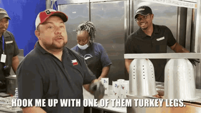 a man in a black shirt says hook me up with one of the turkey legs