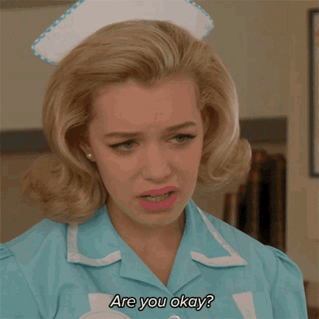 a woman in a nurse 's outfit is asking if she is okay