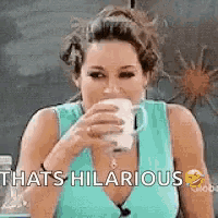 a woman in a blue tank top is drinking a cup of coffee and says `` that 's hilarious '' .