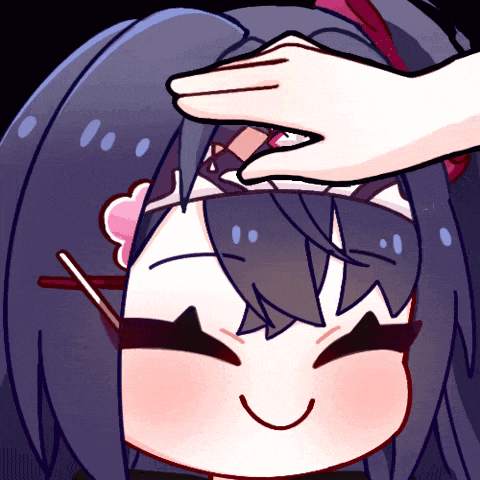 a hand is touching a cartoon character 's face