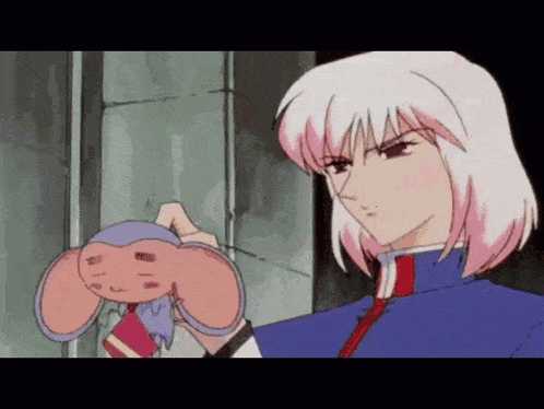 a woman with white hair is holding a stuffed animal in her hand