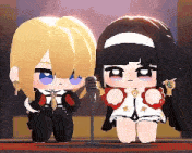 a boy and a girl are sitting next to each other on a stage .
