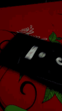 a computer mouse with the letter g on the back