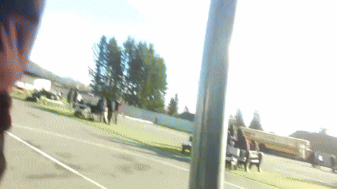 a blurry picture of people walking down the street