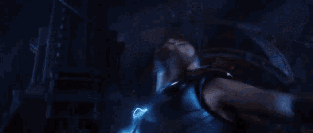 a lightning bolt strikes against a blue sky