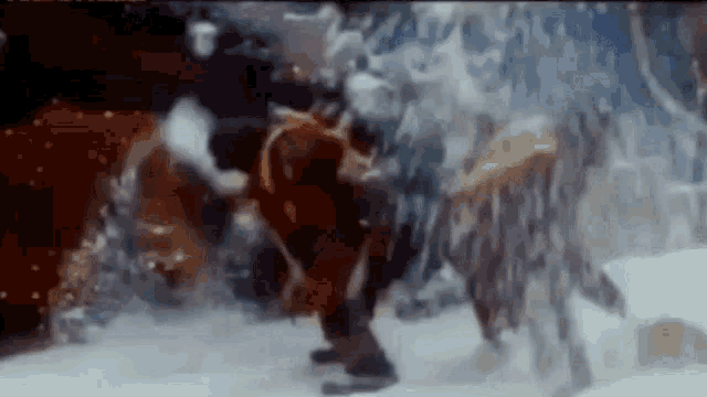 a person is standing in the snow in a dark room with smoke coming out of it .