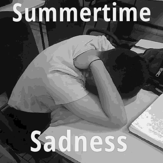 a black and white photo of a person laying on a desk with the words summertime sadness below them