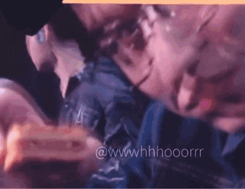a close up of a person 's face with the words " wwwhhhoorrr " on the bottom