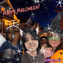 a group of people are posing for a picture with the words happy halloween written in the background