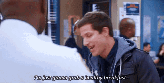 a man is talking to another man in a police station and saying `` i 'm just gonna grab a healthy breakfast ''