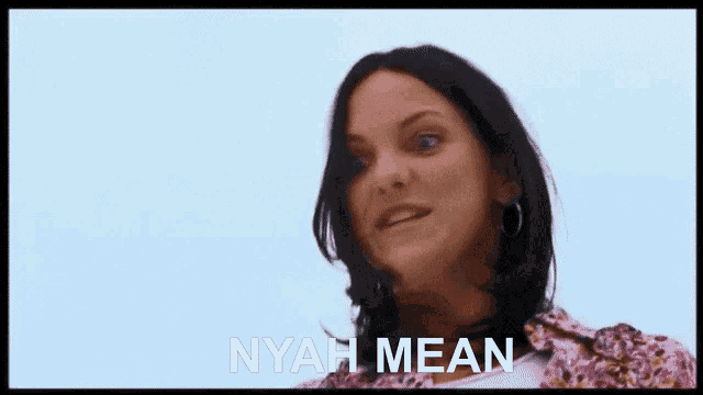a woman laying on the ground with the words nyah mean written on the bottom
