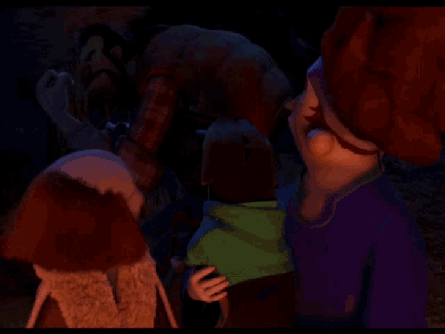 a man with a beard is holding a woman in his arms in a dark room