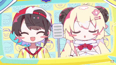 a girl with horns is smiling next to a girl with horns