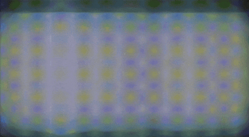 a close up of a letter t on a blue background
