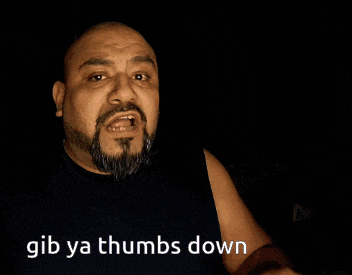 a man with a beard is pointing his finger at the camera with gib ya thumbs down written on the bottom