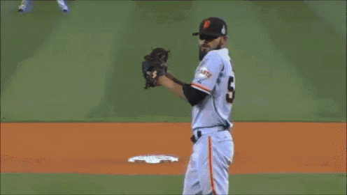 a baseball player with the number 22 on his jersey swings his bat