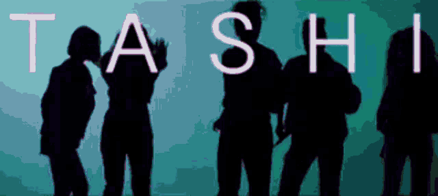 a group of people are standing in front of a sign that says stash