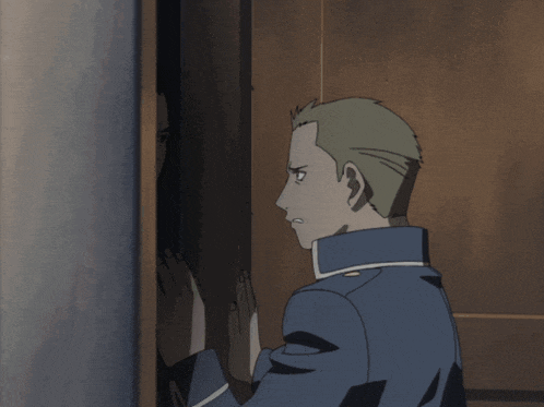 two men are standing next to each other and one has a badge on his chest that says ' a ' on it