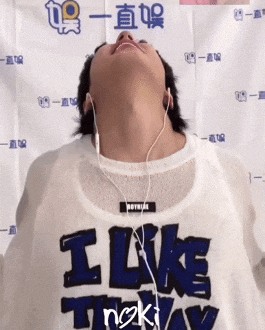 a person wearing headphones and a shirt that says i like this way
