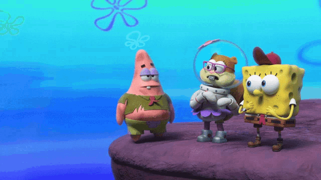 patrick star sandy cheeks and spongebob squarepants standing on a cliff
