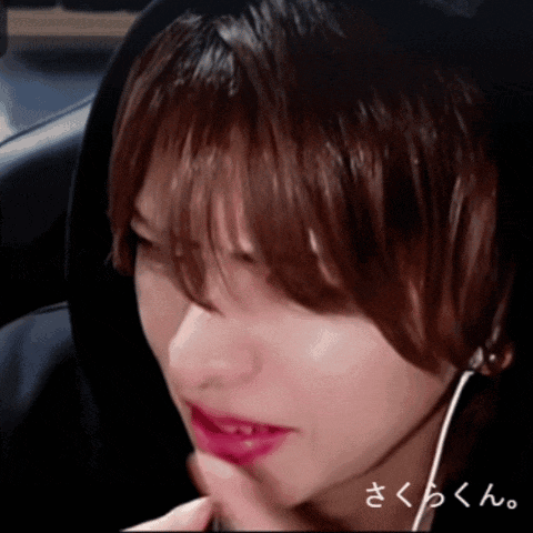 a close up of a person 's face with the word sakura on the bottom right