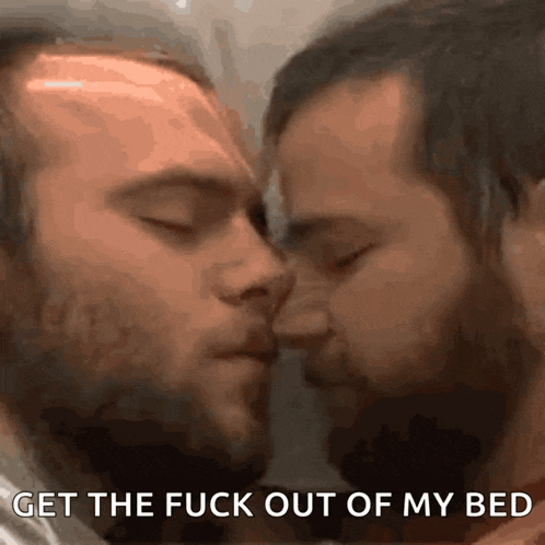 two men kissing with the words " get the fuck out of my bed " in the corner
