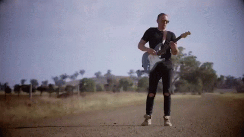 Rocking Out Guitarist GIF - Rocking Out Guitarist Electric Guitar GIFs