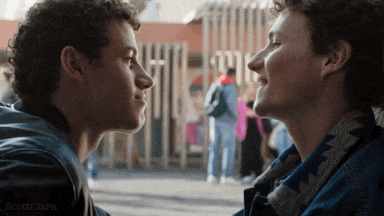 two young men are looking at each other with scottclara written on the bottom