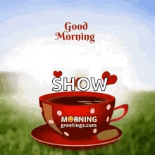 a red cup of coffee on a saucer with the words `` good morning show '' on it .