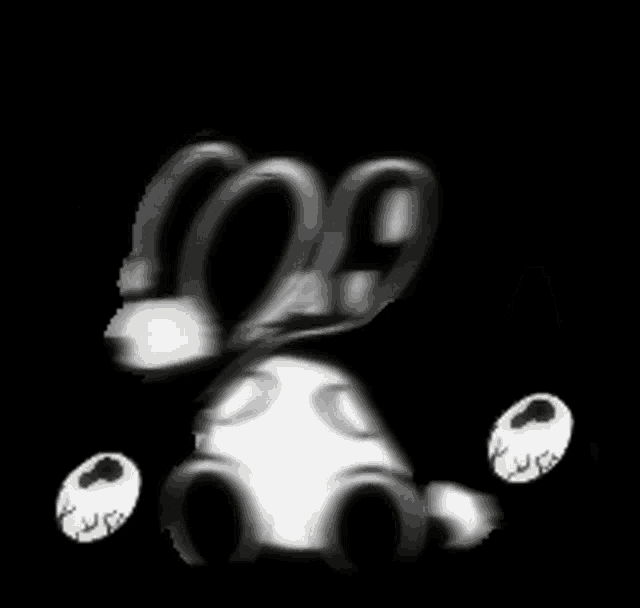a black and white image of a cartoon character with a smiley face .