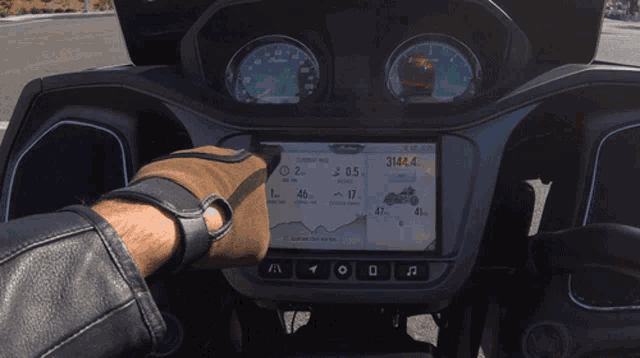 Pointing Motorcyclist GIF - Pointing Motorcyclist Motorcyclist Magazine GIFs