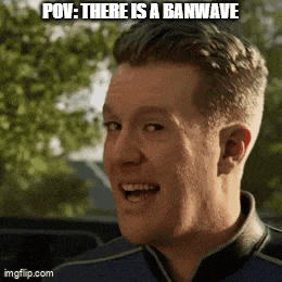 a man is smiling with the words pov : there is a banwave on his face