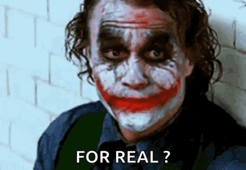 a close up of the joker 's face with the words `` for real '' written next to him .