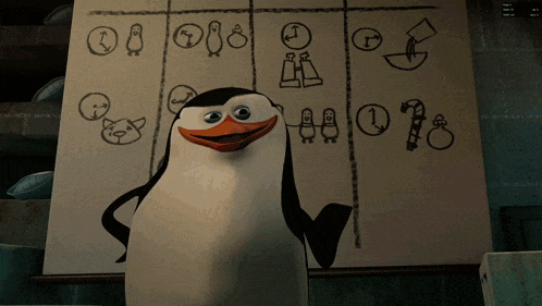 a penguin is standing in front of a white board with drawings on it