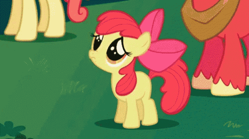 a little pony with a pink bow on her head