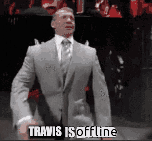 a man in a suit says travis is offline