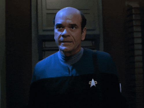 a bald man in a star trek uniform says " you 're unstable "