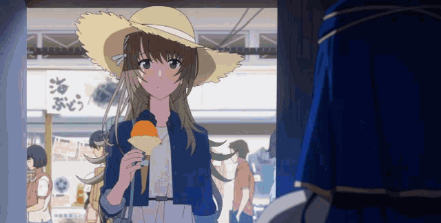 a girl in a straw hat is holding an orange ice cream