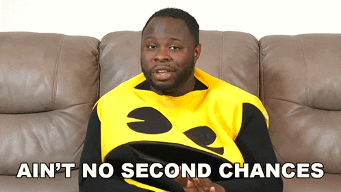 a man sitting on a couch with the words ain 't no second chances on the bottom