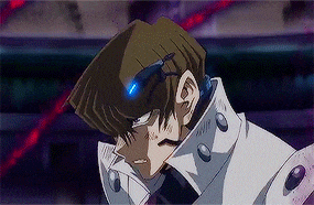 a close up of a person 's face with a blue light on their head