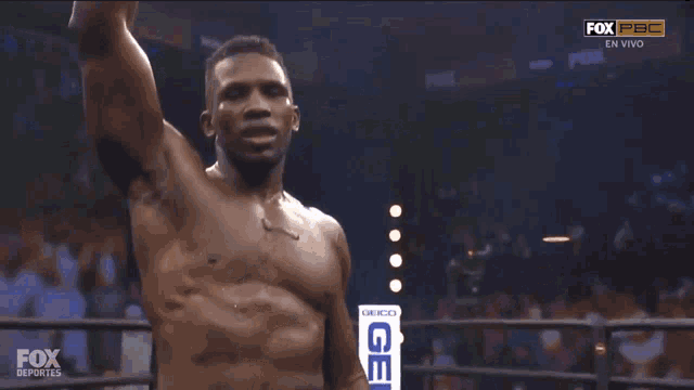 a man in a boxing ring with the word fox on the bottom