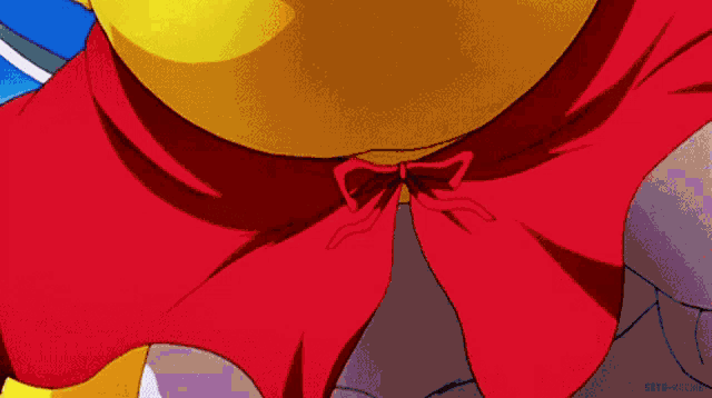 a close up of a cartoon character with a red cape around his neck