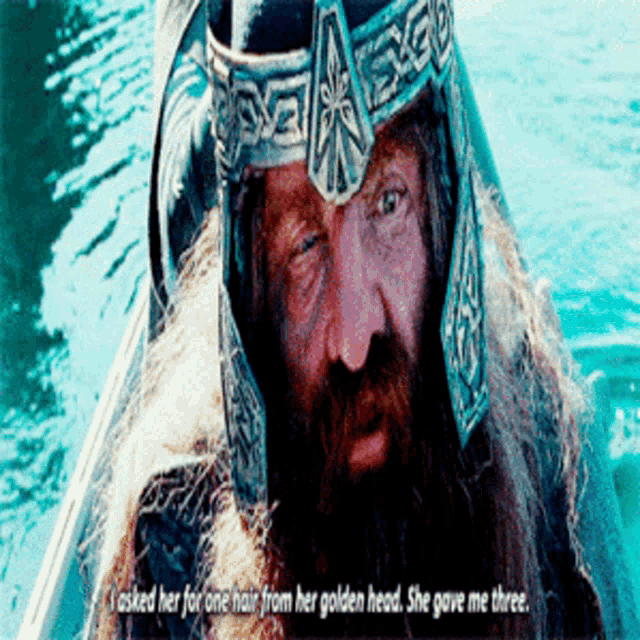 a man with a beard wearing a helmet and a crown says i asked her for one hair from her golden head
